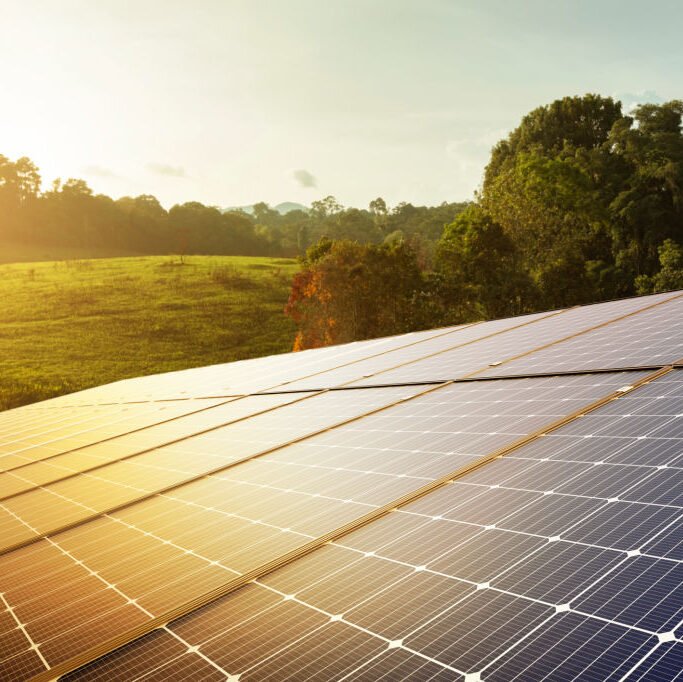 solar panels and green nature, renewable energy. sustainable energy to businesses, homes, and smart city. new generation of power. clean and environmental friendly.